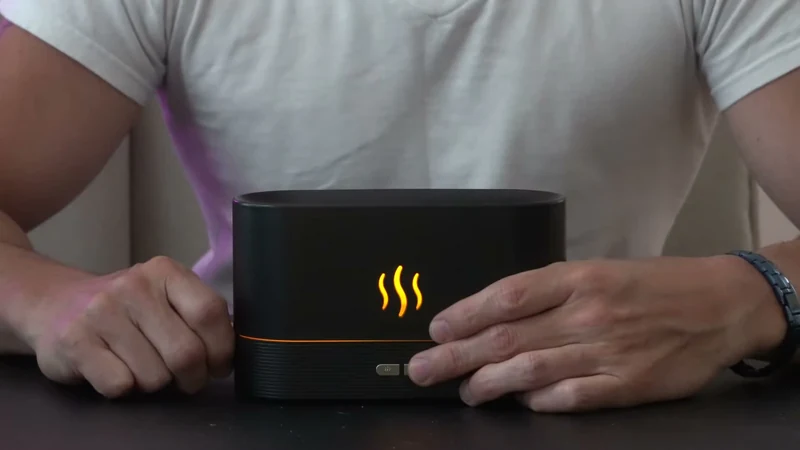 Frente do umidificador com o ícone de três ondas iluminado
